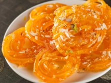 Top Authentic Indian Jalebi Sweets For Diwali Celebration Jalebi is a popular Indian sweet made of deep-fried batter soaked in sugar syrup for a crispy treat.
