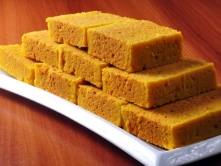 Best Sweet Shop For Order Diwali Sweets In Chennai Mysore Pak Neatly stacked golden-brown blocks of this popular Indian sweet, known for its rich flavour