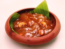 Traditional Tamil Nadu Tirunelveli Halwa Sweets in Chennai A bowl of glossy, rich Tirunelveli halwa with a traditional touch, garnished with cashews and served fresh.