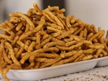 Savor the Unique Taste of Milaku Sevu Dish in Chennai Enjoy the crunch of Milaku Murukku, sprinkled with pepper for an extra burst of flavor